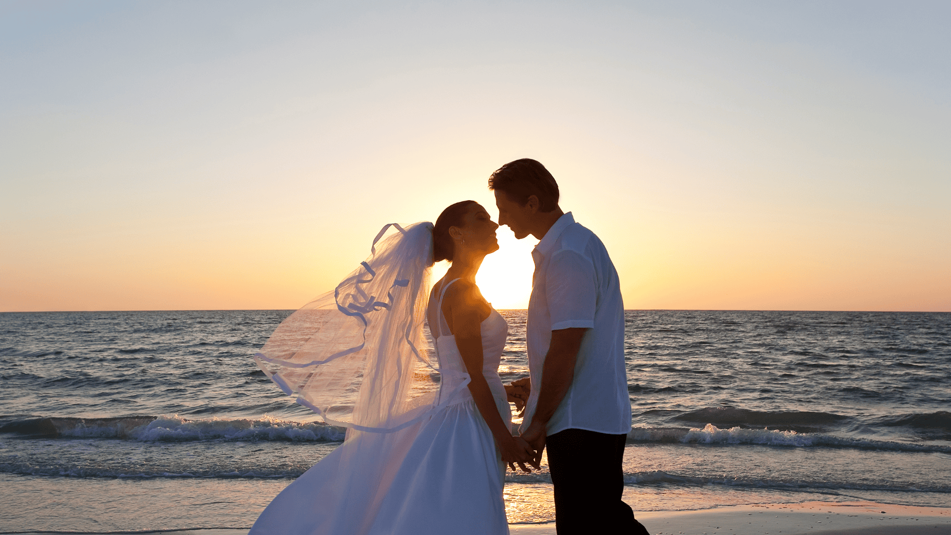 A couple weddiing on the beach.